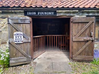 Exterior of Iron Foundry showing open double doors