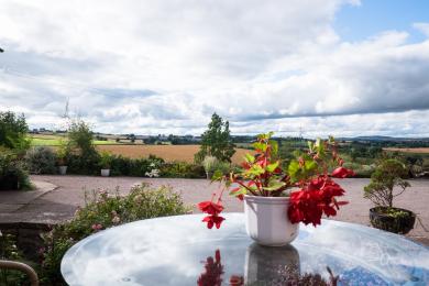 Valley View ,  front  patio, views over the Garron Valley