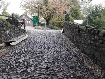 Start of downhill cobblestone route to the village