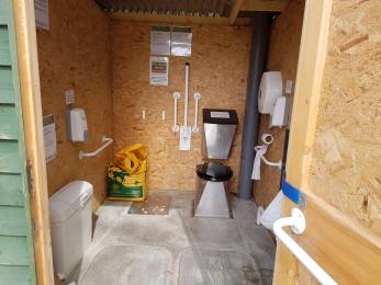 Interior of composing toilet showing toilet facilities