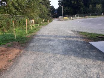 Tar spray and chip path leading to access road