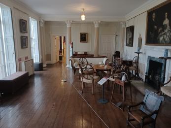Historic drawing room with period furniture and paintings
