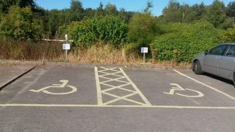 The accessible parking bays near the Visitor Centre, where there is a shallow kerb