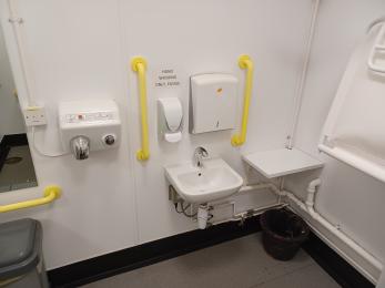 Sink and hand dryer in Space to change