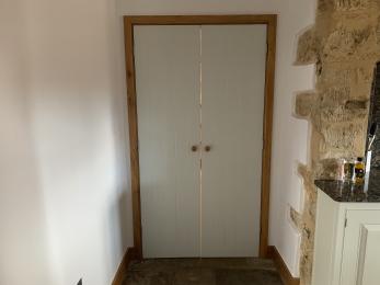 Tew Farmhouse - Example of contrast between wall and door frames 