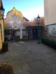 View on Canongate Kirk from back of courtyard