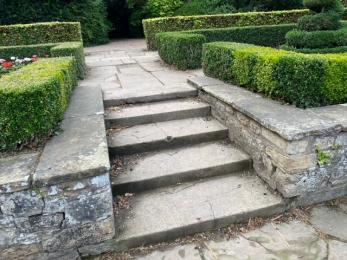 Steps down to the sunken pond in the William and Mary