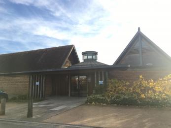 Image of the entrance to Blakesley Hall's Visitor Centre from the carpark
