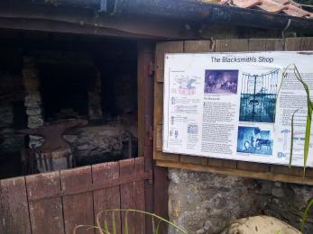 Door of the Blacksmith's workshop. Upper section open for viewing.