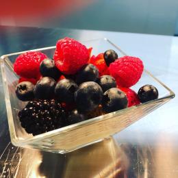 Fresh berries, granola and yoghurt for breakfast