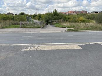 Road crossing with tactile paving and lowered kerbs on both sides