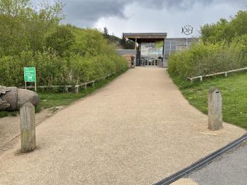 Wide pathway with solid, level surface leading to Dalby Forest Visitor Centre