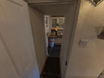 Walkway into Bowmanstead Cottage Kitchen