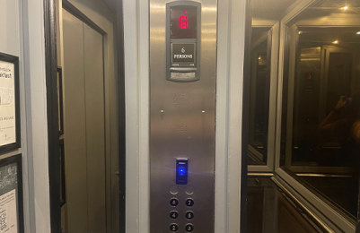 Inside of lift showing panel and numbers on each floor