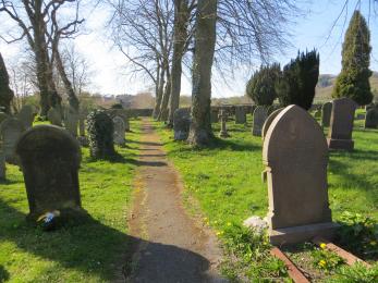 Churchyard paths - first path on left across graveyard 800mm wide.