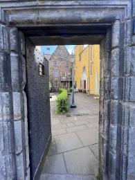 The path from the courtyard door to the main entrance.