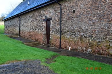 Access pathway from Swift Cottage to Communal Building - paving slabs & grass