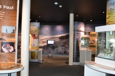 This photo shows the centre of the Hallaton Treasure gallery, there are posts and displays.