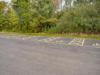 Disabled visitor parking spaces in the main car park