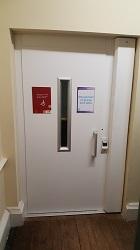 Door to the lift on the ground floor