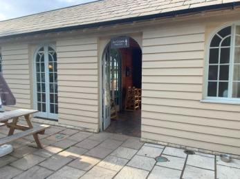 Doorway to the outdoors decking area at the rear of the Boathouse 