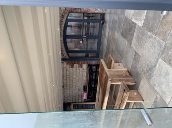 Level access into kitchen from inside the courtyard 