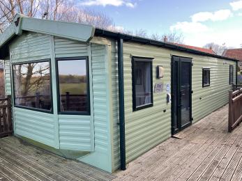 Abbey View Holiday Home showing  wooden decking and level access to the main entrance.
