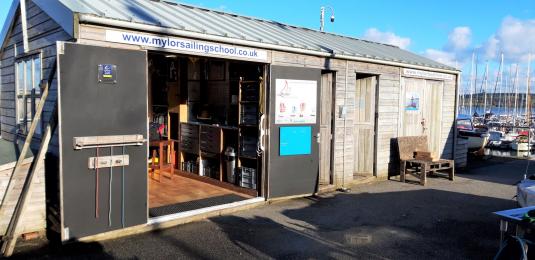 Reception area with double open doors and grab handles at Mylor Sailing and Powerboat School Falmouth Cornwall