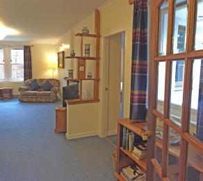 Foresters Lodge lounge looking from kitchen to door RHS which leads to second hallway and double bedroom
