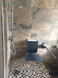 Shower with fitted seat