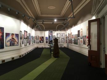 Showing Gallery 1, a large open space with art on the wall