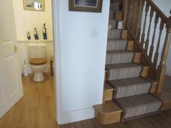Downstairs Cloakroom accessed via stairs from entrance hall