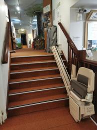 Image of the stair lift which goes from the first floor to discovery center mezzanine
