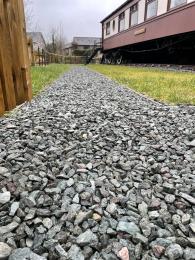 Gravel pathway to the carriages.