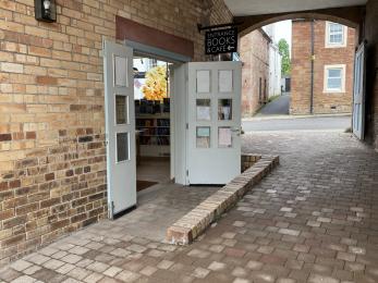 Accessible entrance with double doors open. 