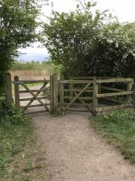 Gate access from the car park to the woodland trail
