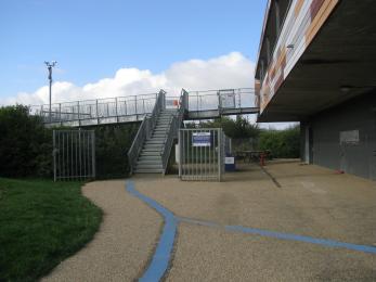 Access to the main toilets are on ground level, to the right of the stairs