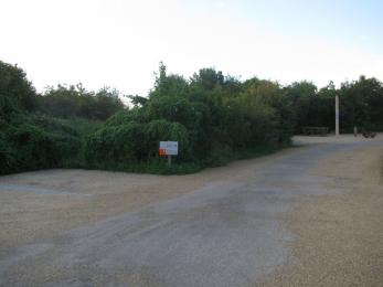 The access ramp to the visitor centre is past the blue badge bays on the left after the bushes. Look out for the ‘Welcome’ pole.