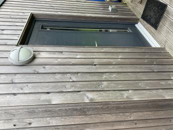 Door to external laundry, accessed directly from decking which surrounds the house. 