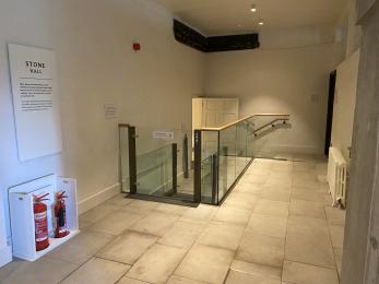 Stone hall lift lobby view from shop