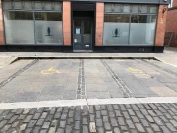 Photograph of two disabled parking bays 