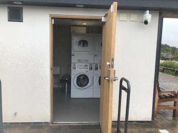 Entrance to the laundry room, door opens outwards