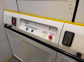 Interior lift control buttons including alarm and emergency stop