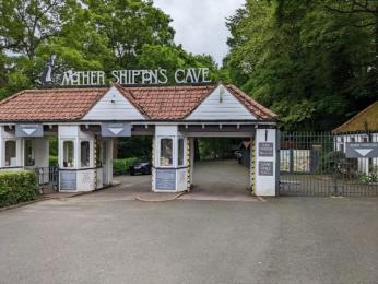 The main entrance at Mother Shipton's Cave cars drive through these gates to check-in, then drive to the car park on site.
