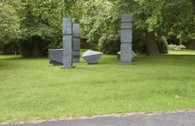 Modern One - Sculpture Park - sculpture on grassy area, no kerb from surfaced path