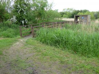 Access to the Ashby Hide is via a natural ground path and a short bridge