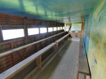 Interior of the Gadwall Hide. A small ramp at the far end leads to the wheelchair accessible space