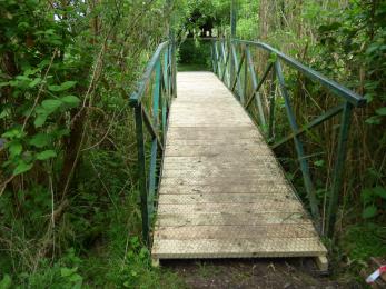 Bridge to the Warbler Hide managed by the Herts & Middlesex Wildlife Trust