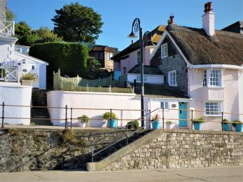 This shows the Lower Parade with the steps leading up to the Upper Parade and Cliff Cottage