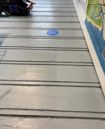Tracks in the floor of the lower museum